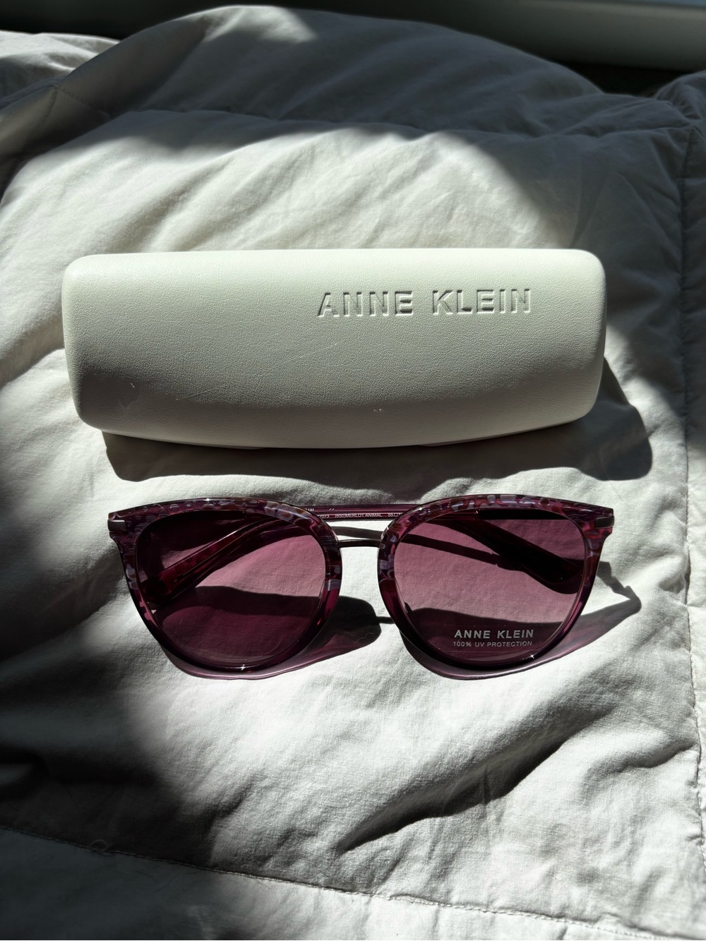 Anne Klein Translucent Purple Cat-Eye Sunglasses with Case